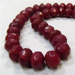 622 CTS FACETED GLASS FILLED ENHANCED RUBY STRAND 16-11 MM
