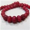 Image 1 : 440 CTS CARVED GLASS FILLED ENHANCED RUBY STRAND 17-10 MM - TEMPORARY CLASP
