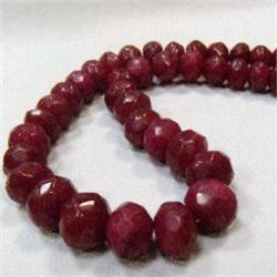 711 CTS FACETED GLASS FILLED ENHANCED RUBY STRAND 11-11 MM
