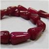 Image 1 : 350 CTS GLASS FILLED ENHANCED RUBY BRIOLETTE STRAND 18x10-17x10 MM - TEMPORARY CLASP