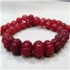 Image 1 : 480 CTS CARVED GLASS FILLED ENHANCED RUBY STRAND 20-10 MM - TEMPORARY CLASP