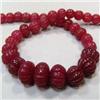 Image 1 : 430 CTS CARVED GLASS FILLED ENHANCED RUBY STRAND 17-10 MM - TEMPORARY CLASP