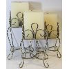 Image 1 : 3 DECORATIVE METAL CANDLE HOLDERS W/ CANDLES