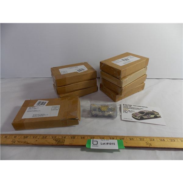 (8) Boxes of 50th Anniversary Gold Die Cast Cars - 1:64 - 7 sealed, one opened for pictures