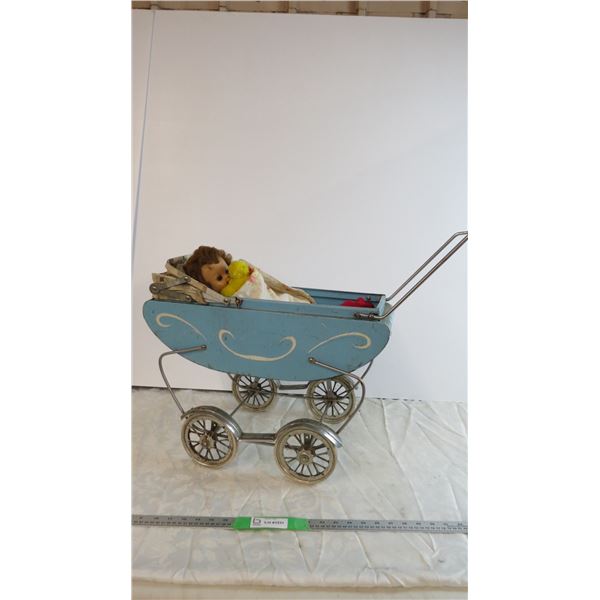 * Toy Doll in toy Stroller