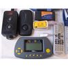 Image 2 : Box of remote controls,phone holders,video games,timer,jack,surge protector
