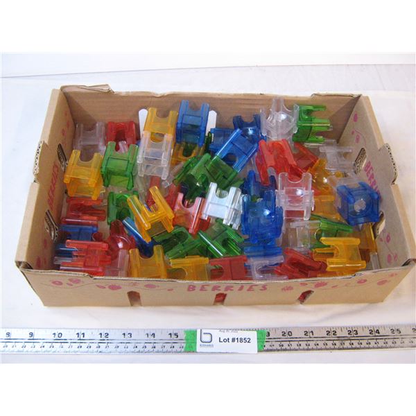 Box of plastic interlocking blocks