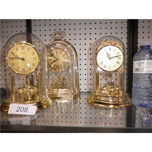 clocks in glass cloches