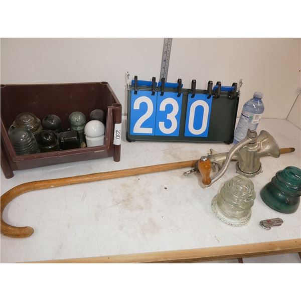 walking cane, manual grinder, glass insulators