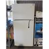 Image 1 : Maytag Refrigerator w/ top freezer - some repaired damage to the inside of the door as seen in photo