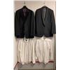 Image 2 : "Superheroes Show" - Rack full of black suit jackets/ black pants/ cream long sleeve button shirts &