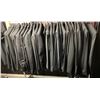 Image 1 : "Superheroes Show" - Rack full of black suit jackets & formal pants (approx. 30 pcs.)