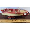 Image 2 : PLASTIC AND TIN MOTOR-BOAT W/ TRAILER 