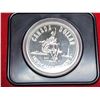 Image 2 : 1975 Calgary Centennial Silver Dollar. Specimen. Bright White. Housed in its original black clamshel
