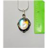 Image 1 : 13)  NATURAL OVAL RAINBOW ROCK CRYSTAL