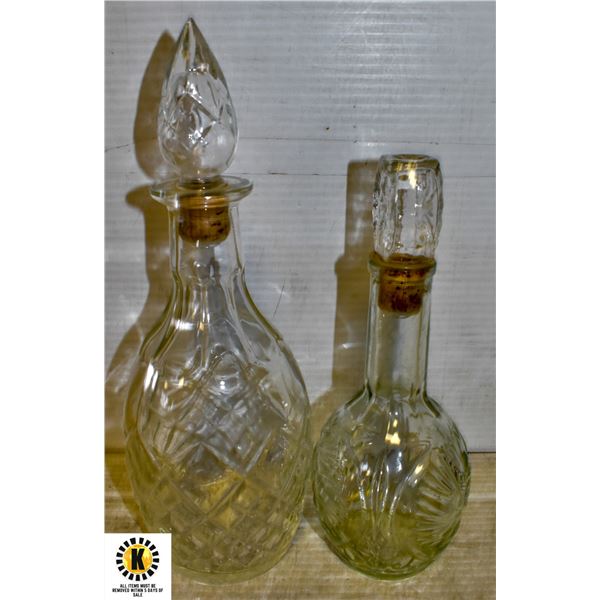 TWO GLASS LIQUOR BOTTLES