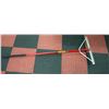 RED HANDLED METAL RAKE