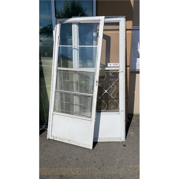 2 STORM DOORS 32 X 80 INCH ONE WITH FRAME 2-storm-doors-32-x-80-inch-one-with-frame