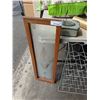Image 2 : METAL BOTTLE RACK WITH FRAMED GLASS PANEL AND VINTAGE HYDRO METER