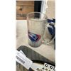Image 7 : MONTREAL CANADIENS SHORTS SIZE 31, CANUCKS BAG, PATRIOTS MUG, EASTERN CONFRENCE 711 MUG AND HOCKEY S