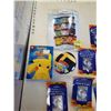 Image 2 : LOT OF POKEMON COLLECTIBLES - PREMIUM CARD PACKS, POKEBALL, POSTERS, CARDS AND DVD