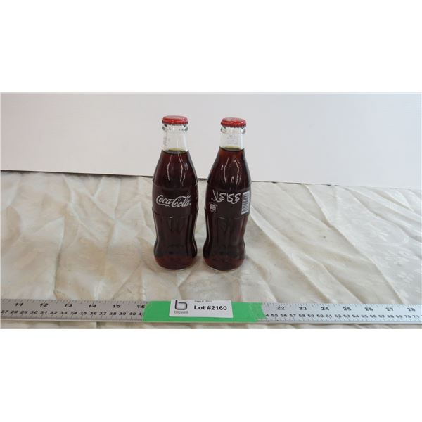 (2) Sealed Middle Eastern cokes