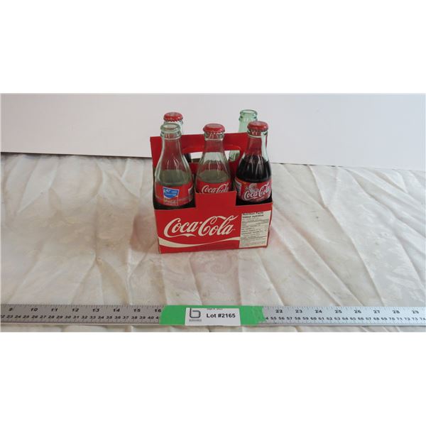 (5) pcs assorted Coke in case - Athens and Santa coke