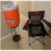 Image 1 : Roots "Mizzy Lake" Camping Chair, Rubbermaid 5-Gallon Water Jug, and 2-Tier Metal Stand