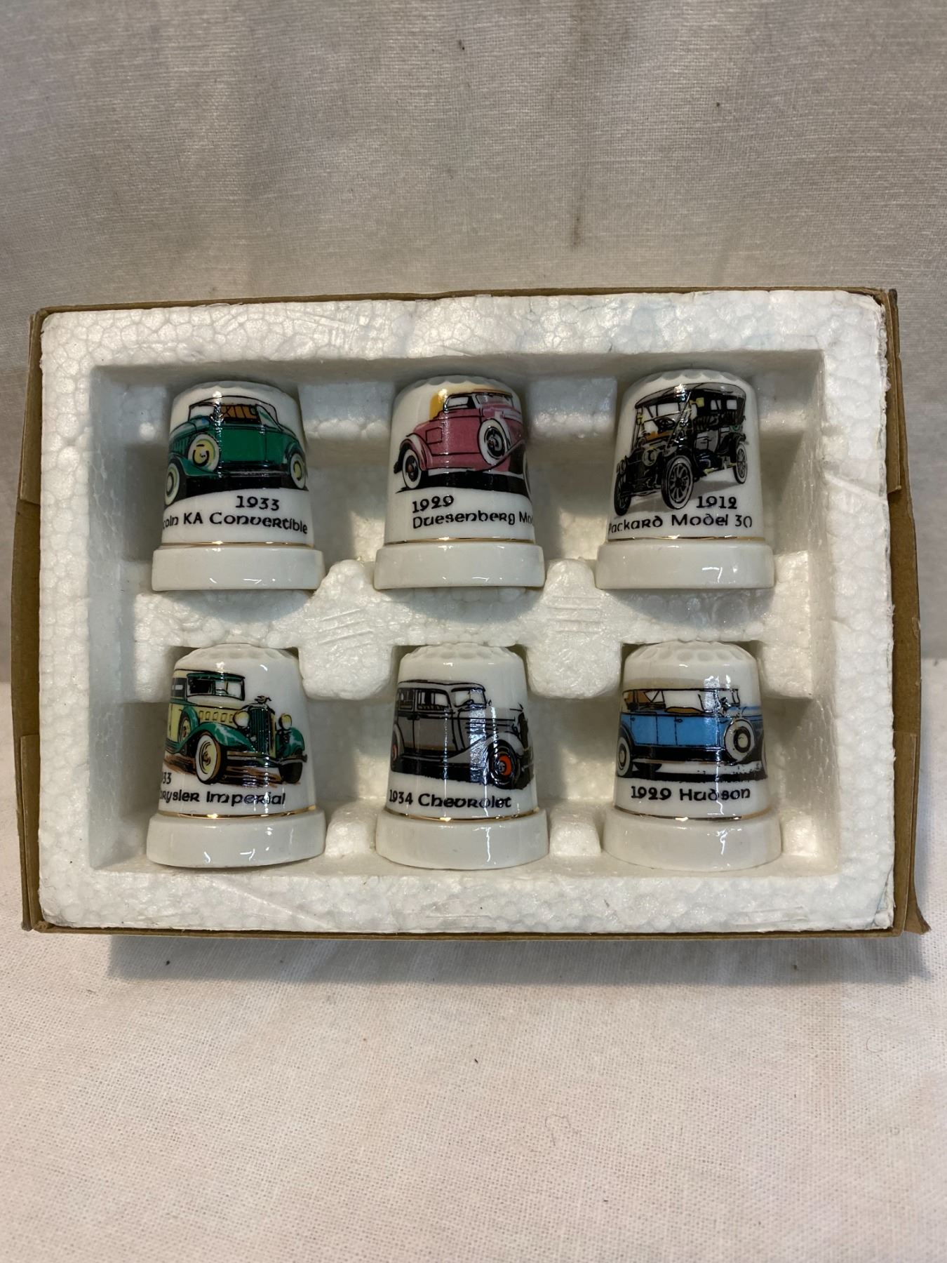 Vintage car thimble set