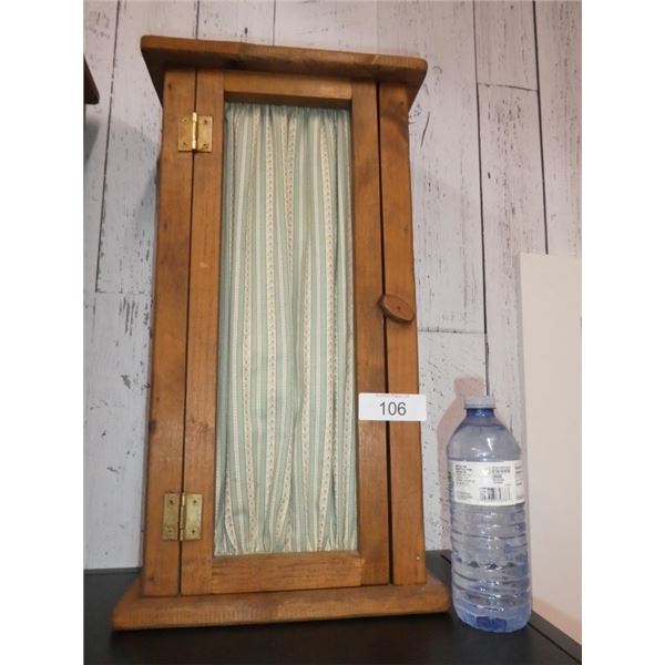 wooden shelf with cloth cut-out