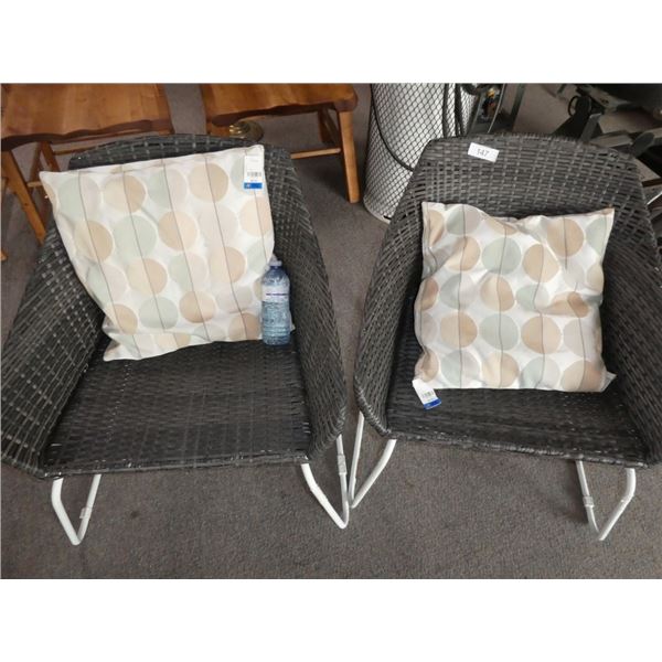 two lawn chairs w/ cushions