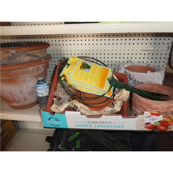 Assorted clay pots and saucers for plants