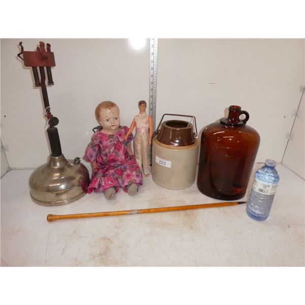brown glass jug, ceramic pot, dolls, lamp stand