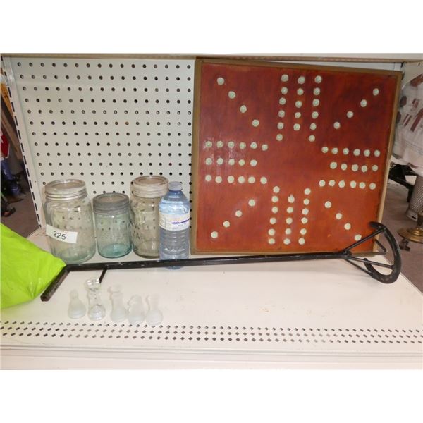 canning jars, chess pieces, marble game board
