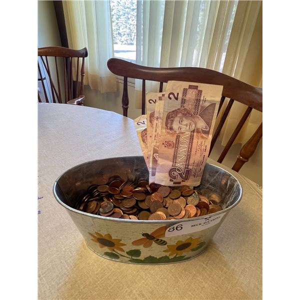 Container Of Pennies And Canadian 2 Dollar Bills