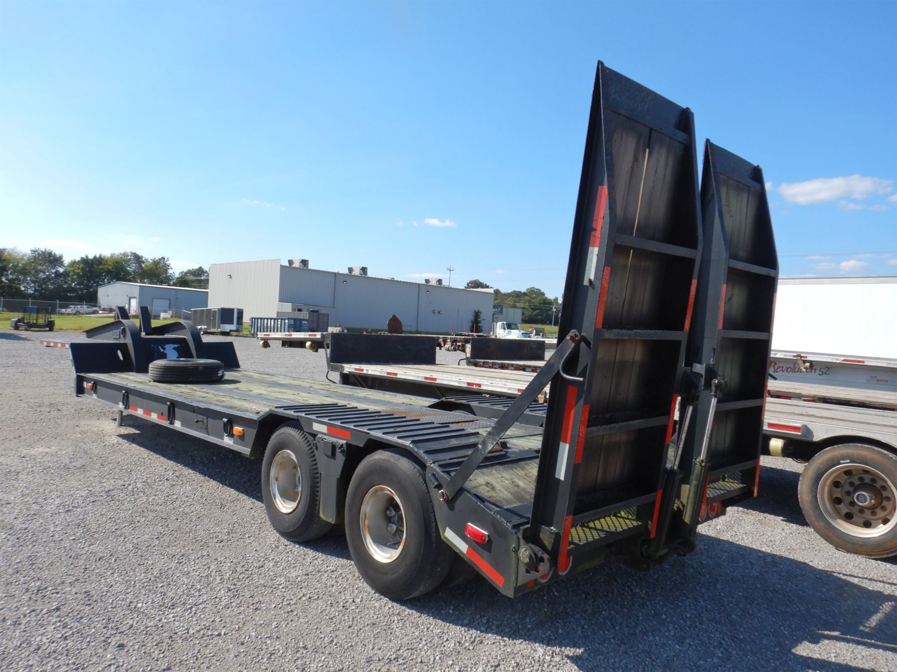 PHELAN Lowboy Trailer J.M. Wood Auction Company, Inc.