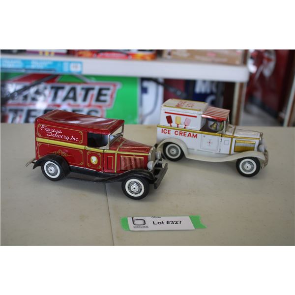 (2) Vintage tin delivery trucks