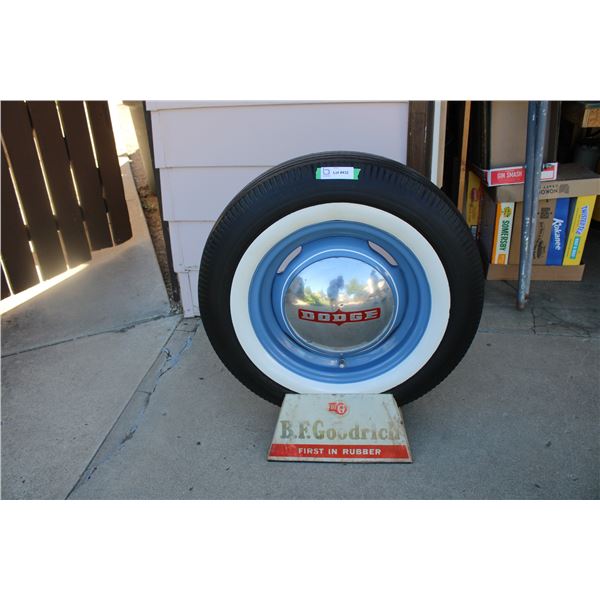BF Goodrich tire stand with display tire + dodge hubcap