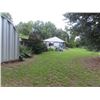 Image 4 : 1.96 Acres  HOME + OVERSIZED GARAGE/CARPOT + OUT BUILDINGS & LARGE POLE BARN