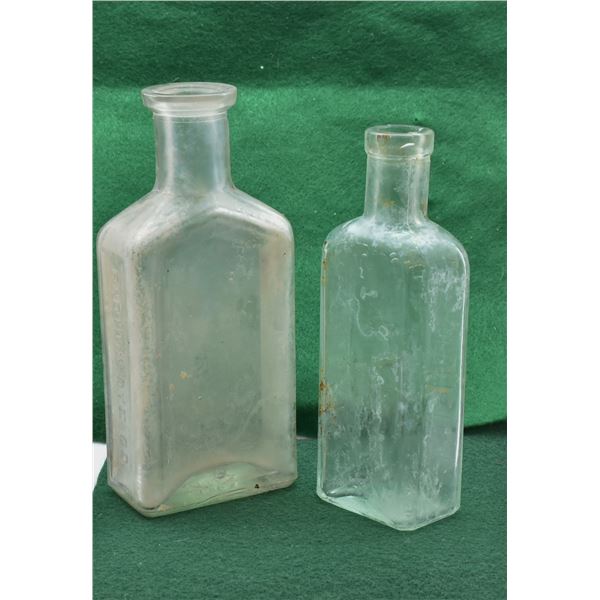 2 Antique Embossed Glass Bottles