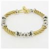 Image 1 : Fancy 14K Yellow & White Gold Twisted Tube Rolo Style Link Chain Toggle Bracelet