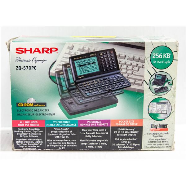 NEW "SHARP" ELECTRONIC ORGANIZER