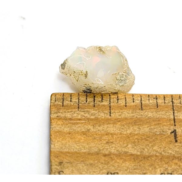 20)  NATURAL ROUGH 5.5 CT ETHIOPIAN FIRE OPAL