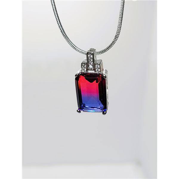 27)  RECTANGULAR CUT RED & BLUE TITANIUM