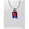 Image 1 : 27)  RECTANGULAR CUT RED & BLUE TITANIUM