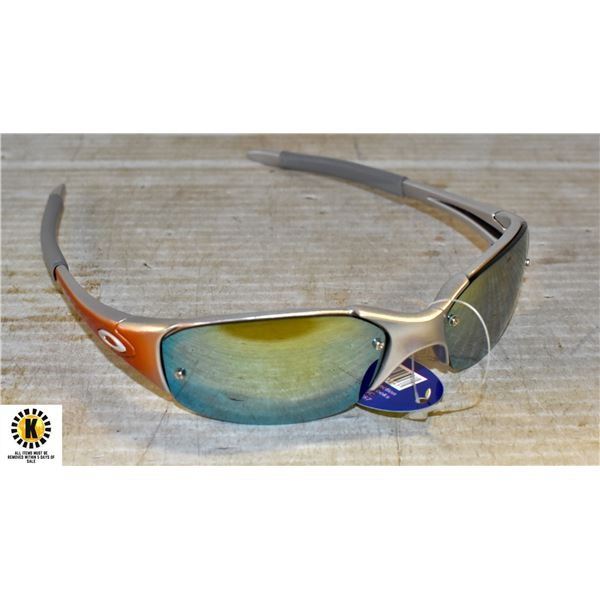 PAIR OF GREY AND ORANGE OAKLEY REPLICA SUNGLASSES