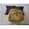 Image 1 : (2) decorative pillows and one comforter(size unknown)