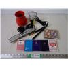 Image 1 : (2) Hair Straighteners(untested), (7) decks of cards, misc. Items