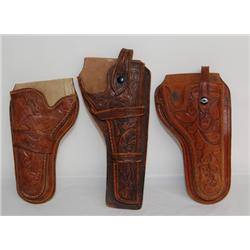 THREE WESTERN HOLSTERS