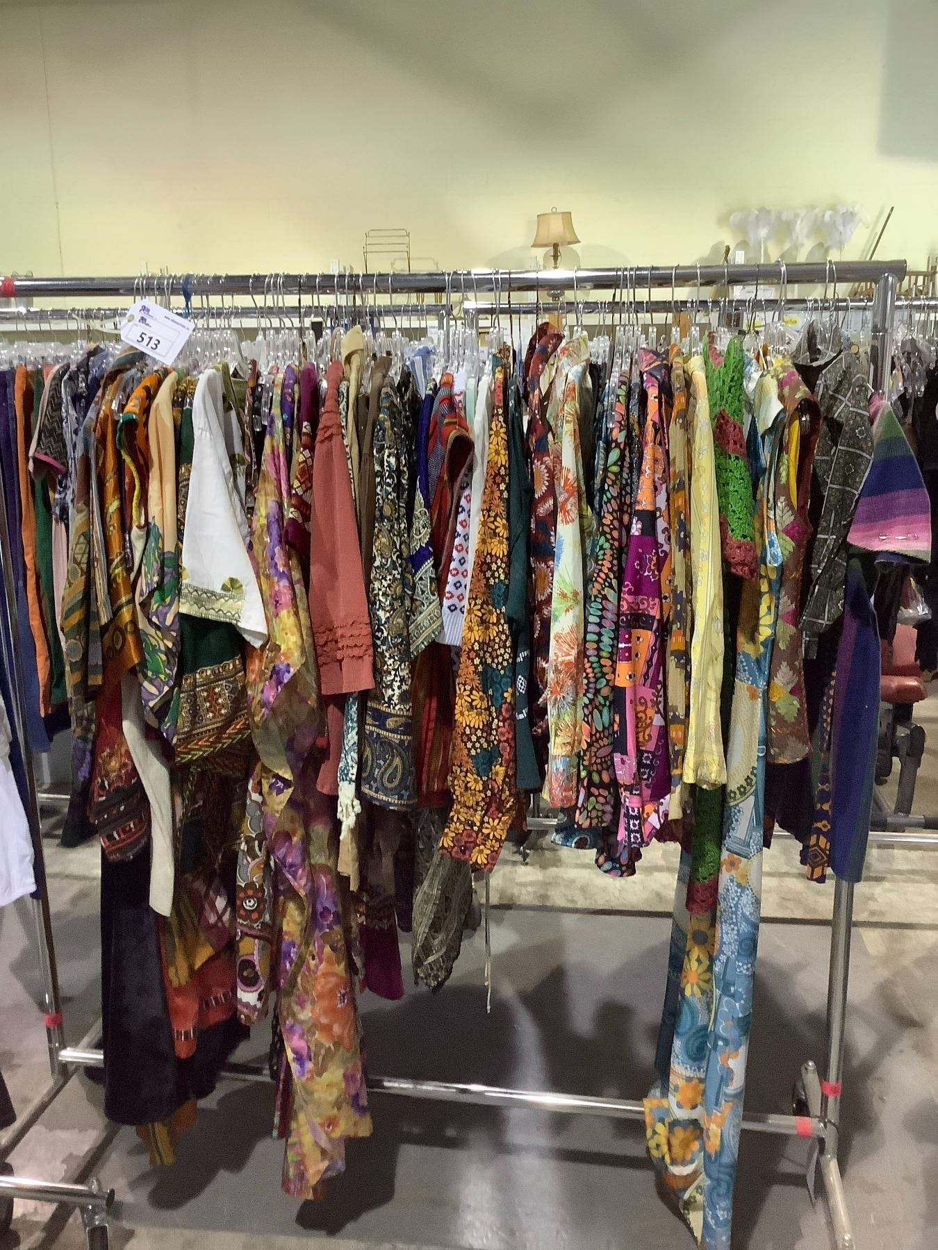 RACK OF ASSORTED CLOTHING (RACK NOT INCLUDED)